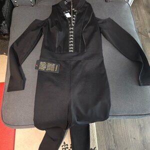 Cold shoulder brand new bebe jumpsuit